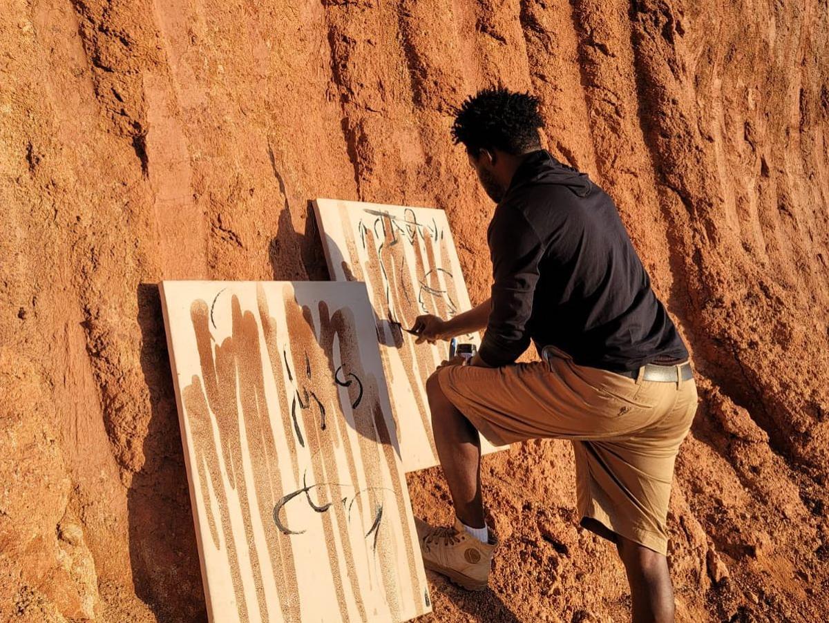 Kader working in the studio